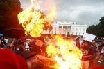 US flag burnt, burning US flag, 2 protesters arrested for burning u s flag outside white house on american independence day, American independence day