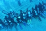 NRI and team break Guinness world record for the longest human chain underwater, Guinness world record for the longest human chain underwater, nri and team creates guinness world record, Suneet jain