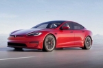 Tesla new electric car breaking news, Tesla new electric car breaking news, tesla to launch electric hatchback without a steering wheel, Tesla car